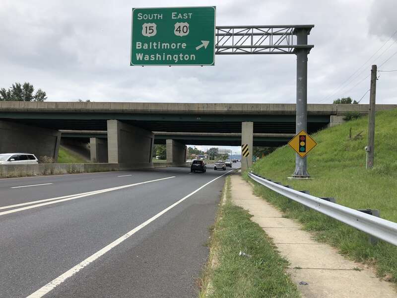 View west along U.S. Route 40 (West Patrick Street) at the exit for U.S. Route 15 SOUTH and U.S. Route 40 EAST (Baltimore, Washington) in Frederick, Frederick County, Maryland