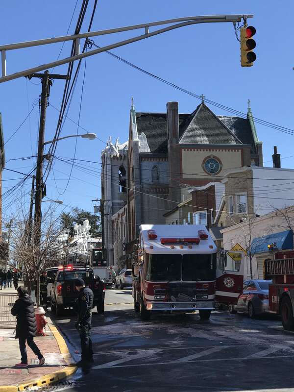 Looking east on 14th Street from the corner of Summit Avenue in Union City, New Jersey, on March 5, 2017. Pictured is the remains of SS. Joseph and Michael Parish Church on Central Avenue, to which a fire that started around 1am EST on March 4 at