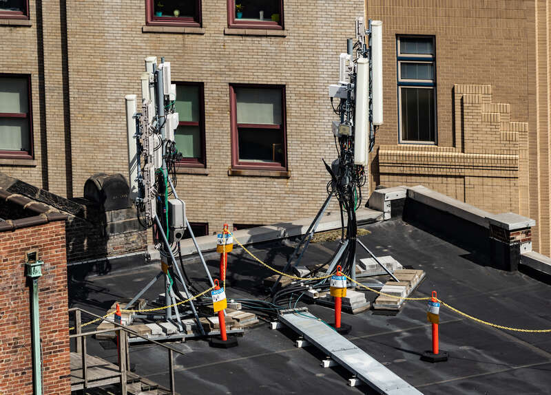5G cellular antennas on a rooftop in downtown Pittsburgh, Pennsylvania.
