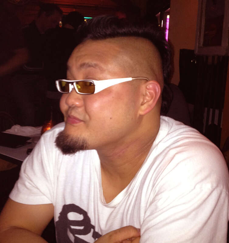 Photograph of asian man experiencing the alcohol flush reaction (permission granted)