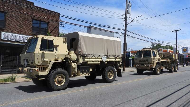 Looking northwest across Forest Avenue on a clearing midday