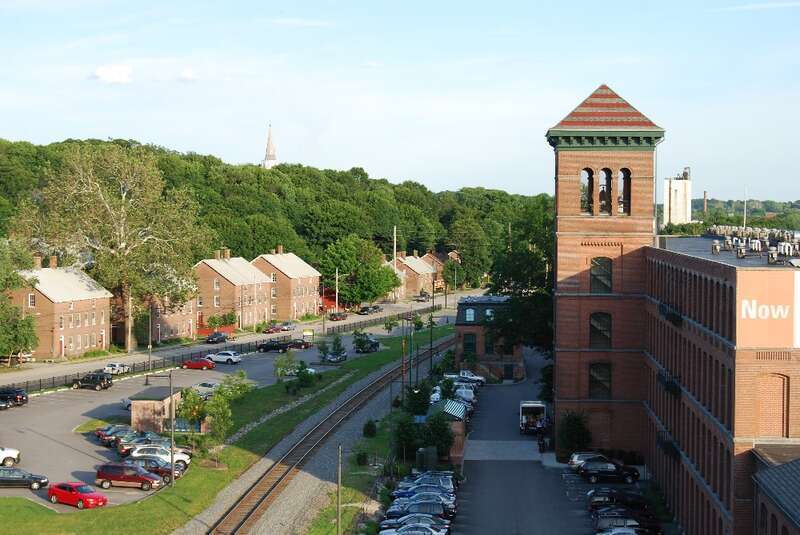 View of historic Ashton Mill Village, showing former mill and worker housing. Cumberland, Rhode Island
