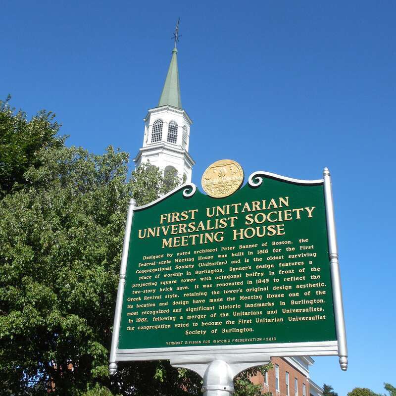 Historical wayfinding signage of the Unitarian Church at the top of Church St. in Burlington, Vermont.  The building was added to the National Register of Historic Places (NRHP) as a contributing property of the Head of Church Street Historic