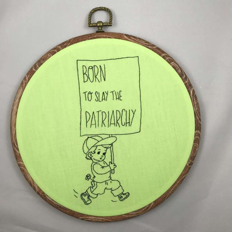 Shannon Downey aka Badass Cross Stitch re-images vintage coloring book pages as modern feminist fiber art. This piece was created for the Anti-Art Fair in London in 2018