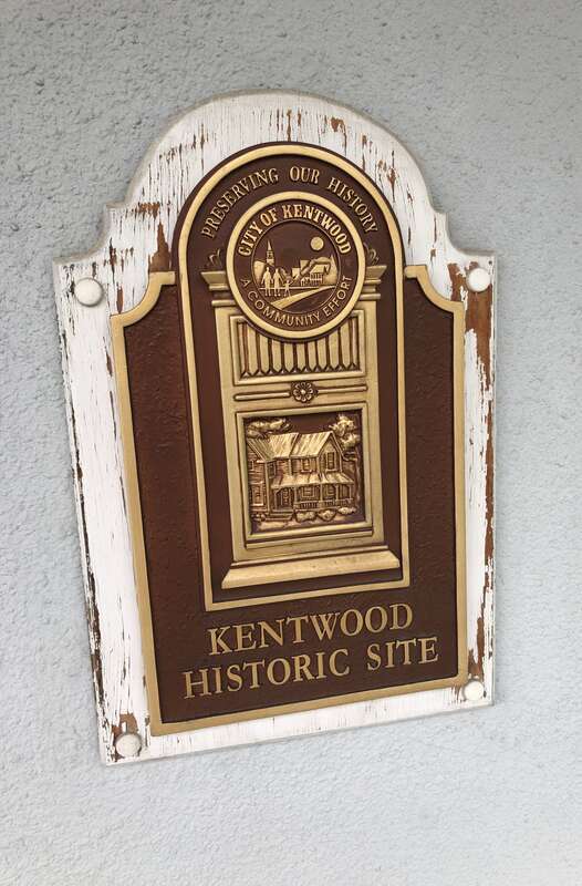 Marker designating the Bailey House as a Kentwood Historic Site.