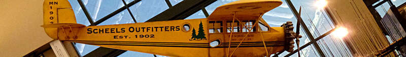 Wikivoyage banner for Sparks, NV showing the airplane located inside the Scheels sporting goods store.