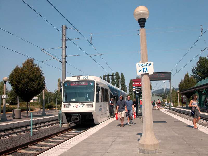 A MAX Light Rail train unloading on the center track at the Beaverton Transit Center station, having just ended a trip on the Red Line