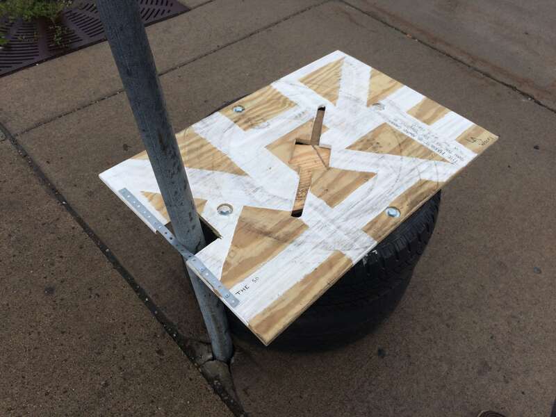 Design was updated with cut out section and attaching to pole using metal banding. Stop was dropped at Cass and Antoinette in Detroit, MI
