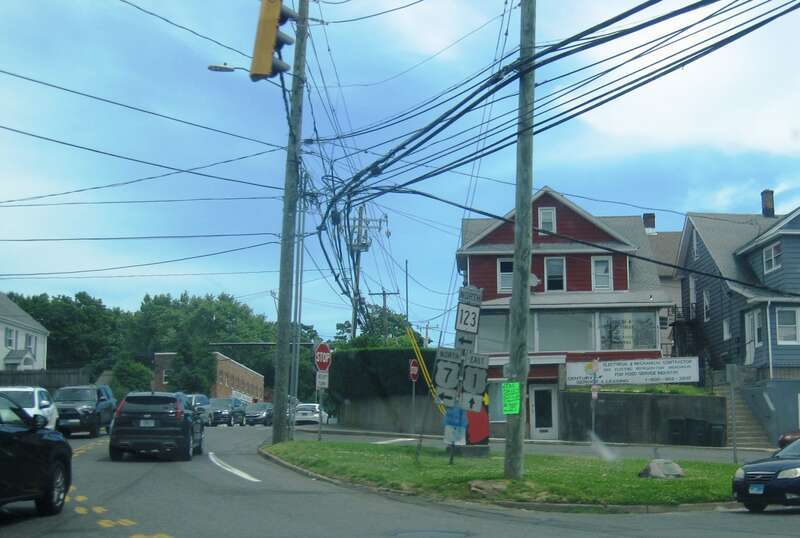 Photo of the southern terminus of Connecticut Route 123 (Main Street) at U.S. Route 1 (Cross Street / North Avenue) in Norwalk, Connecticut. Photo taken looking east. Note the old shield assembly for US 1 noting the road as an east-west road.