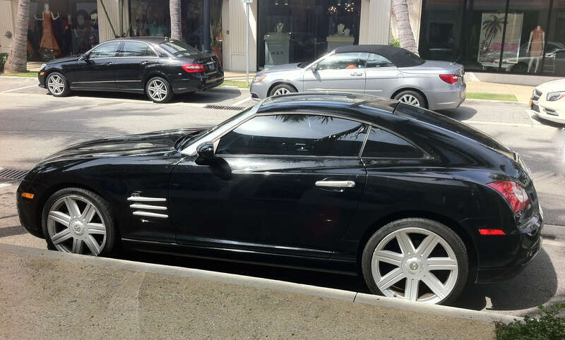 Chrysler Crossfire fastback finished in black. Photographed on Worth Avenue in Palm Beach, Florida, U.S.A.
