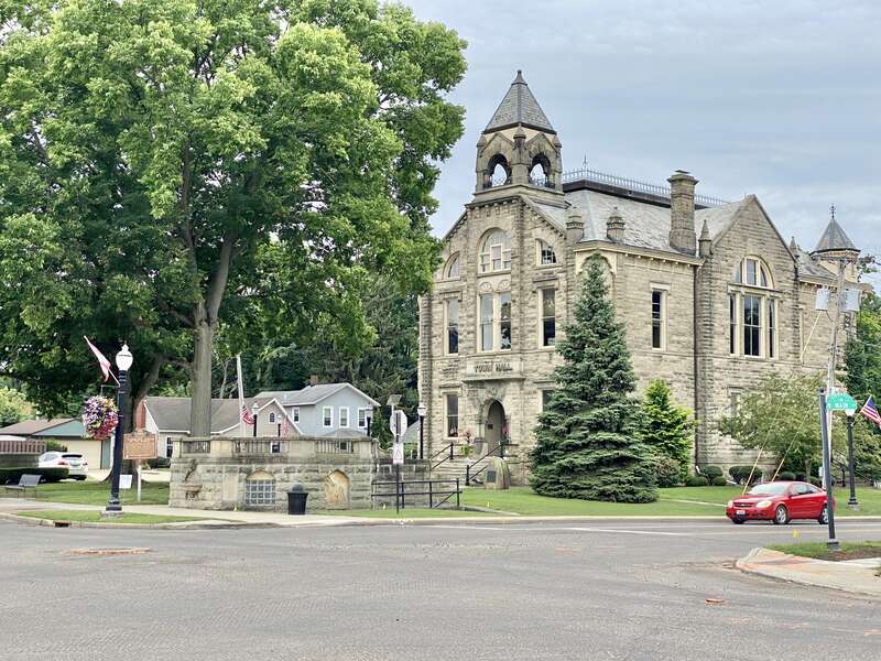 Built in 1884, this Queen Anne-style rusticated Amherst sandstone building was constructed to house the municipal government and municipal services for the city of Amherst.  The building sits on the Amherst town square in Downtown Amherst, with a