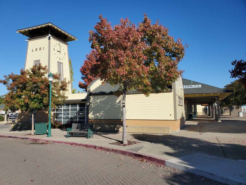 The clock tower and an outbuilding at Lodi station in November 2024