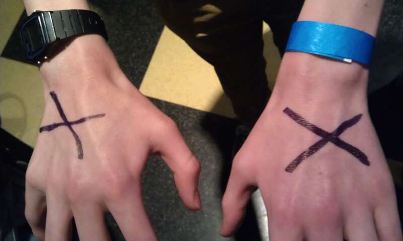 &quot;Passout&quot; crosses on hands at a Wikimania 2012 party