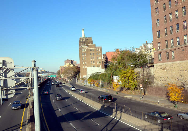 Looking north from 161st Street pedestrian overpass at en:Major Deegan Expressway on a sunny November afternoon. Lighthouse building in background. EXIF says September due to photographer's error.