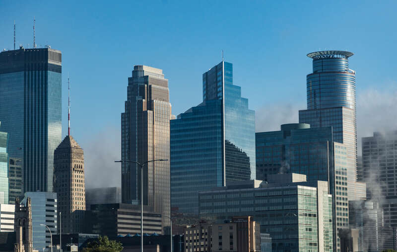 The skyline of Downtown Minneapolis, Minnesota, on an early August morning.