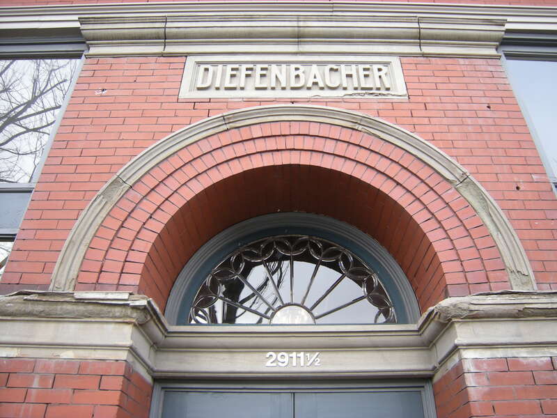 Entrance, 2911-1/2 Hewitt Avenue, Everett, Washington, USA. This block of Hewitt is listed on the National Register of Historic Places as Swalwell Block and Adjoining Commercial Buildings.