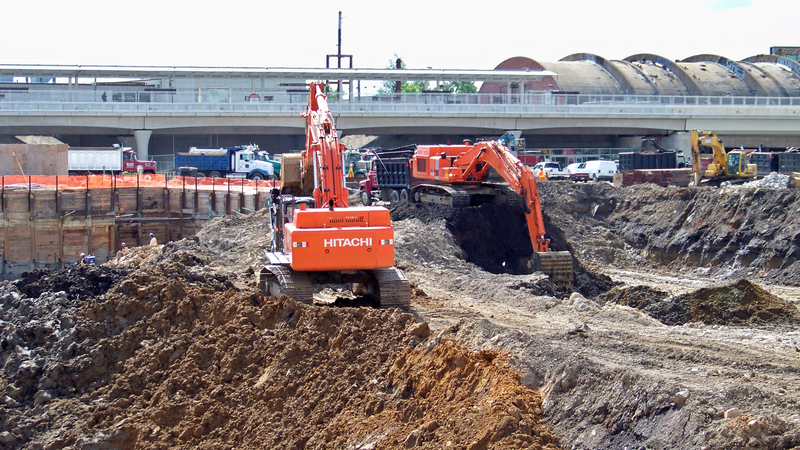 Excavation underway for the construction of several office buildings in the NoMa neighborhood of Washington, DC.

Ben Schumin is a professional photographer who captures the intricacies of daily life.  This image may be used under Creative Commons