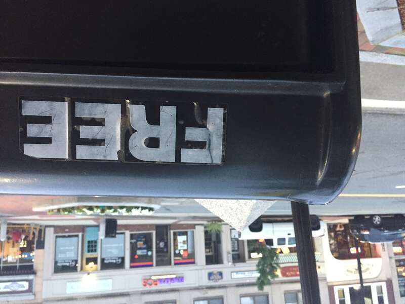 &quot;FREE&quot; posted on a magazine dispenser in Southern, New Hampshire