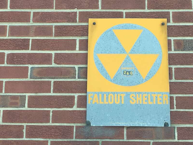 A sign designating this building as a fallout shelter