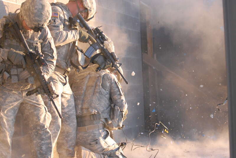 Officers of 1st Stryker Brigade Combat Team, &quot;Ready First&quot; 1st Armored Division, participate in an urban combat exercise at a training facility on Fort Bliss, Texas, May 11-12.
1st Stryker Brigade Combat Team, 1st Armored Division
Photo by Staff Sgt.