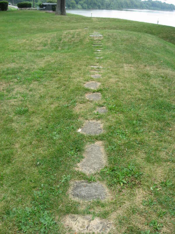 Foundations of a wall at the site of Fort Defiance, located atop a bluff overlooking the confluence of the Auglaize and Maumee Rivers in Defiance, Ohio, United States.  Built in 1794, the fort served as U.S. Army headquarters before the Battle of