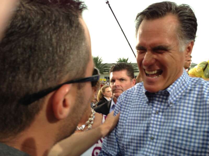 Governor Mitt Romney with campaign aide Mike Norris, after campaign rally in Port St. Lucie, Florida.