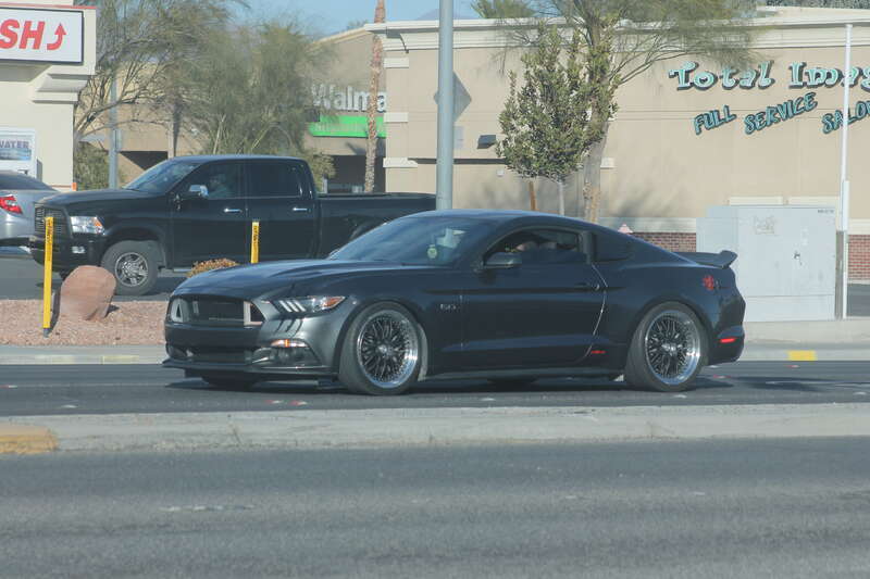 A grey sixth-generation Ford Mustang with various customizations. Photographed in Las Vegas.