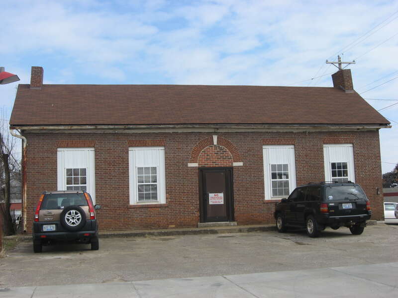Front of the Hall House, located at 104 W. Main Street in Bowling Green, Kentucky, United States.  Now an automobile repair shop, it is listed on the National Register of Historic Places.