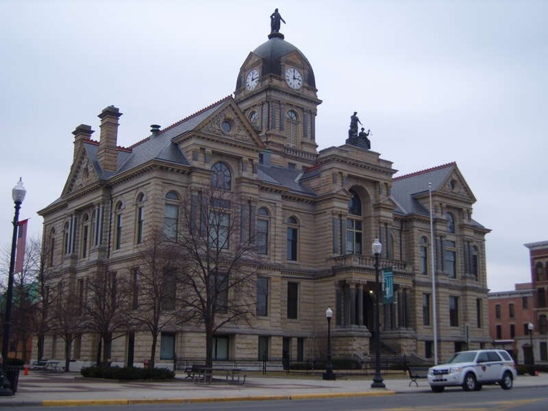 Front of the Hancock County Courthouse, located at the intersection of Main and Main Cross Streets in downtown Findlay, Ohio, United States.  Built in 1885, the courthouse is listed on the National Register of Historic Places.