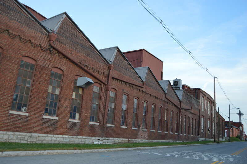 Western side of the remnants of the Henry Vogt Machine Company Shop, located on Eleventh Street south of Ormsby Avenue in Louisville, Kentucky, United States.  Built in 1902, it is listed on the National Register of Historic Places.