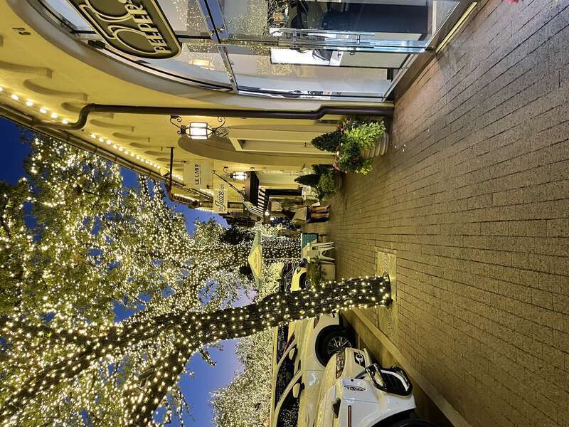 Highland Park Village at night