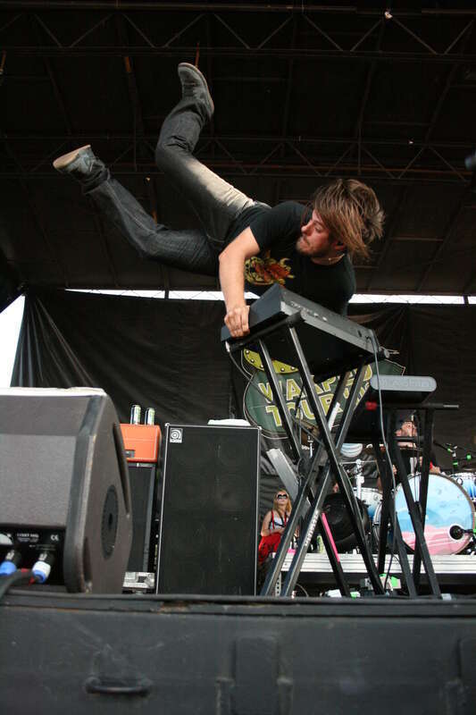 Jesse Johnson, keyboardist for rock group Motion City Soundtrack, performs a &quot;Moogstand&quot; -- a handstand on his Moog synthesizer -- on August 14, 2008.