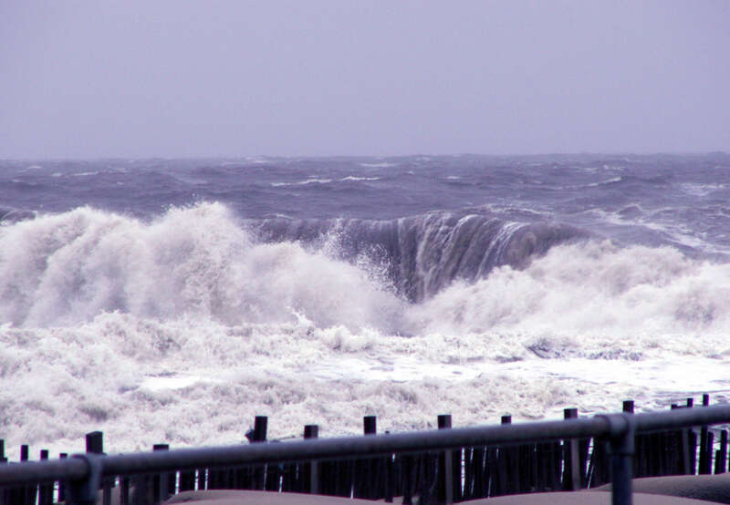 RUN! 

This is the most excited I've every seen the Atlantic Ocean.  Even during hurricanes it wasn't this choppy.  I was so lucky to see this!