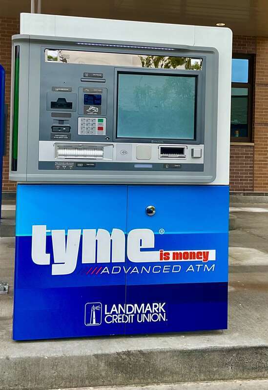An automated teller machine for a Landmark Credit Union branch in Greenfield, Wisconsin, which uses the former &quot;Tyme is money&quot; branding prominent across the