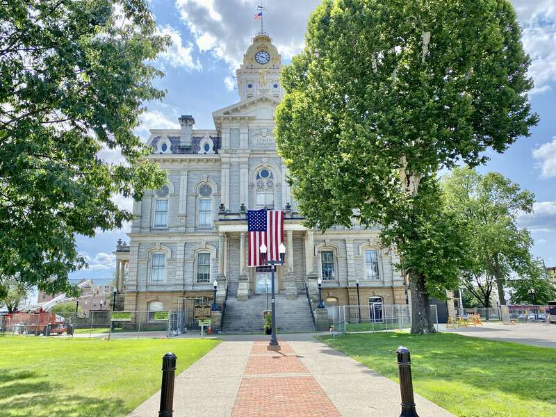 Built in 1876-1878, this Second Empire and Renaissance Revival-style courthouse was designed by H. E. Myer, and replaced a previous courthouse on the site that was destroyed by fire in 1876.  The building features a mansard roof, rusticated stone