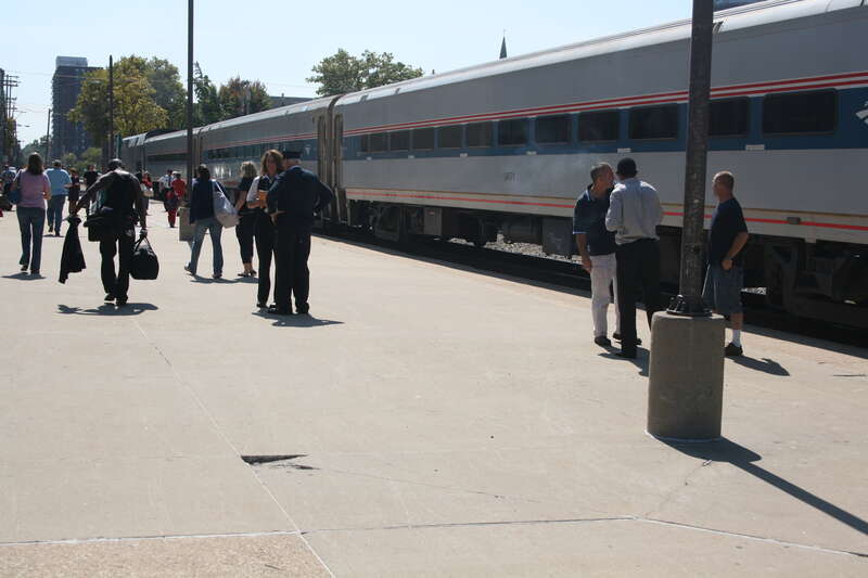 Passengers board and unboard the Lincoln Service Amtrak train bound for St. Louis.