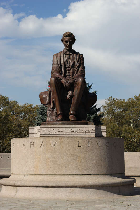 Medium shot of Lincoln the Mystic statue in Jersey City, NJ