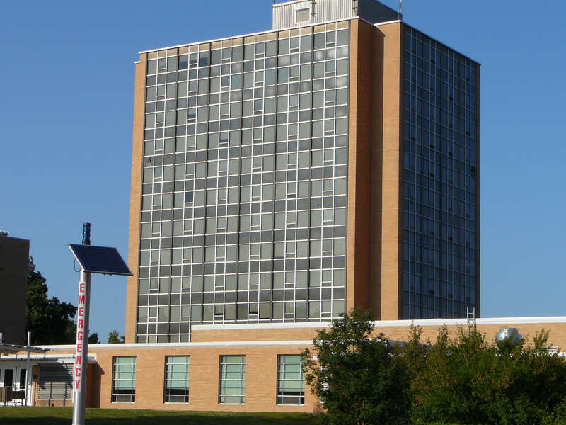 A photo of WIU Washington Residence Hall on West Adams Drive in Macomb, Illinois, with Grote resident Hall in the Foreground