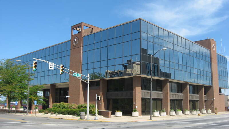 Southern and eastern sides of the Madison County Courthouse, located in the block surrounded by Eighth, Main, Ninth, and Meridian Streets in Anderson, Indiana, United States.  It was built in 1973 to replace a historic courthouse that was a victim of