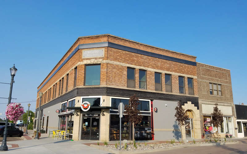 The McLeod building (1907) in Caldwell, Idaho, also known as the Lavering building or Ackley's Market, borders the Indian Creek Plaza.