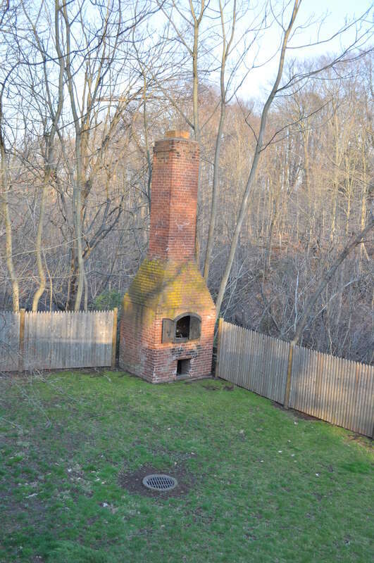 Chimney near Pameacha Creek behind Mills A &amp;amp; B, Wilcox, Crittenden Mill, South Main, Middletown, Connecticut, USA.
