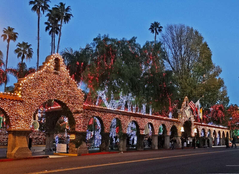 (1 in a multiple picture album)
The Mission Inn covers a full square block.  This is the east half of the south facade.  Through the main arch is the walkway up to the registration desk.  You pass under another arch/bell tower along the way. I think