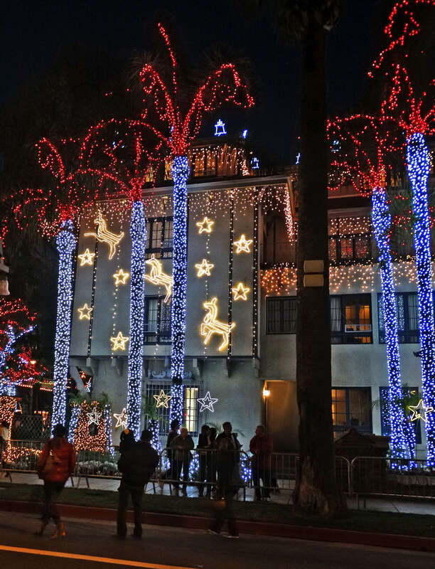 (1 in a multiple picture album)
Decorated palm trees front the southeast corner of the Mission Inn.