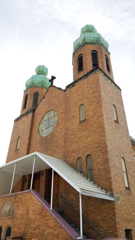 Northeast view of the main entrance and towers of St. Vladimir's Ukrainian Orthodox Church located at 2280 W. 11th Street in the Tremont neighborhood of Cleveland, Ohio, in the United States.
St. Vladimir's parish was founded in 1924 by immigrants