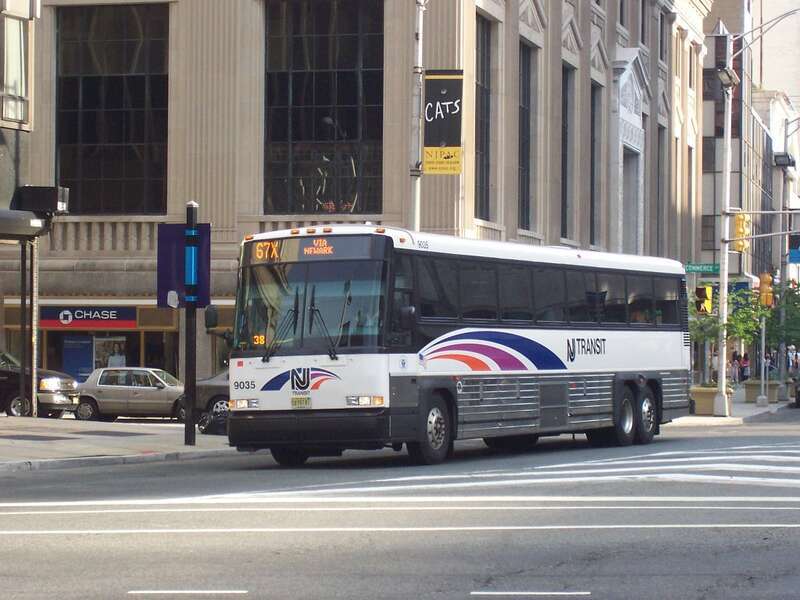 New Jersey Transit MCI #9035, in Newark, New Jersey at Broad Street and Raymond Boulevard on the 67X.