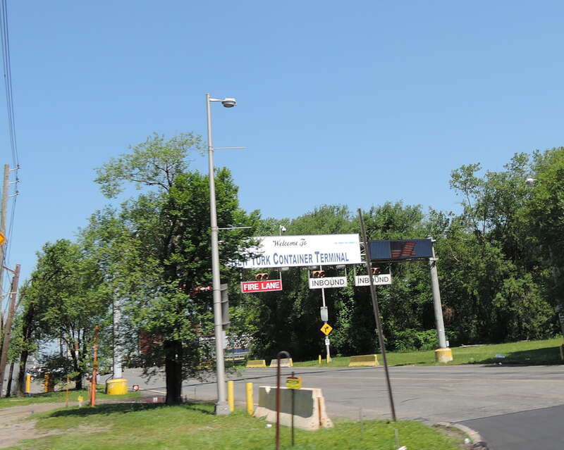 Looking northwest at western gate of container terminal on a sunny day.