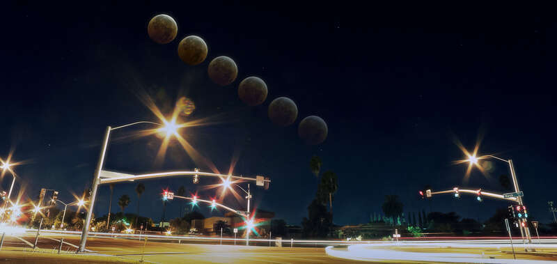 This image is a chronicle of Wednesday morning's lunar eclipse captured from a very urban area of Stockton, ca. Making this image happen was a bit of fantasy mixed with astronomy, photography and knowledge of fine art landscape shooting techniques,