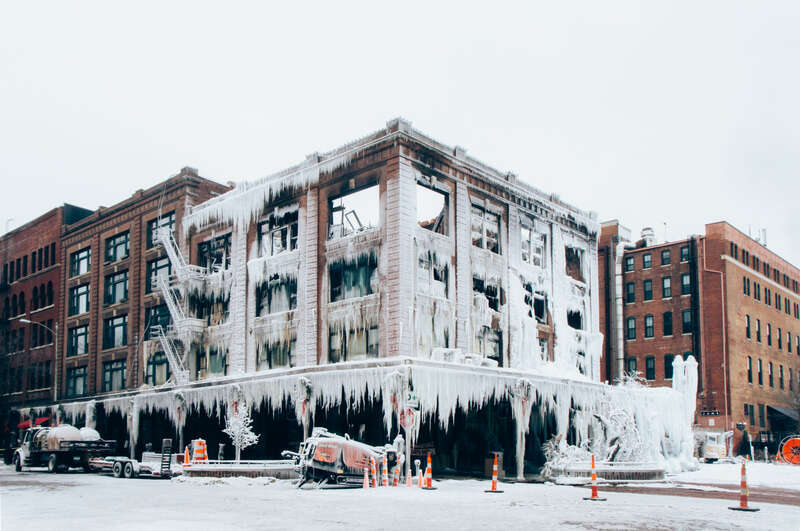 500px provided description: After an explosion, a fire, and hours of trying to put out that fire in frigid temperatures, here's what was left. [#fire ,#city ,#winter ,#cold ,#urban ,#architecture ,#building ,#market ,#ice ,#icicle ,#pub ,#nebraska