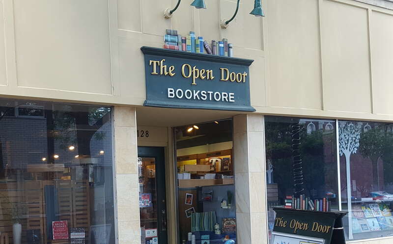 The Capital District Tourism Gnome loves to read, and he gets his books in Schenectady, New York at the Open Door Bookstore and Gift Shop on Jay Street.