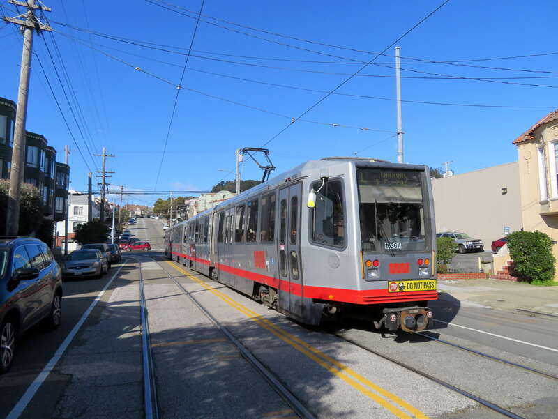 An outbound train at 15th Avenue and Taraval in February 2019